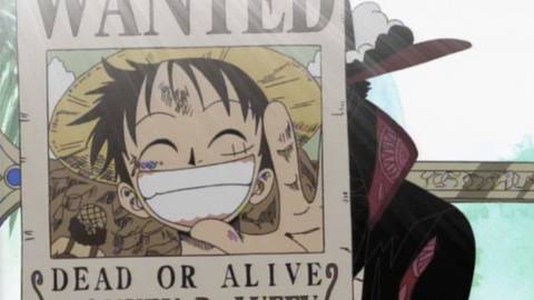 an image of a wanted poster — Luffy is smiling on it 