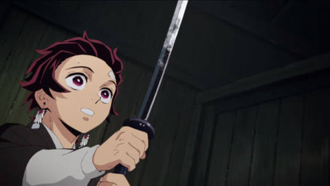 Tanjiro holding his Nichirin sword on Demon Slayer