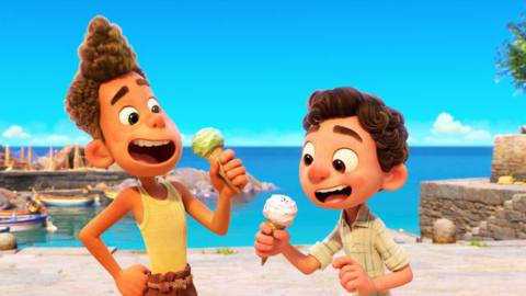 Two boys eat ice cream by the sea in Pixar’s Luca