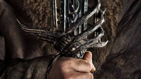 A close up of an ornate sword hilt with a broken blade on a character post from The Lord of the Rings: The Rings of Power. 