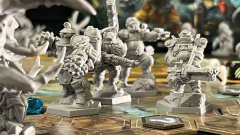 Early versions of the Deep Rock Galactic miniature dwarves, surrounded by aliens.