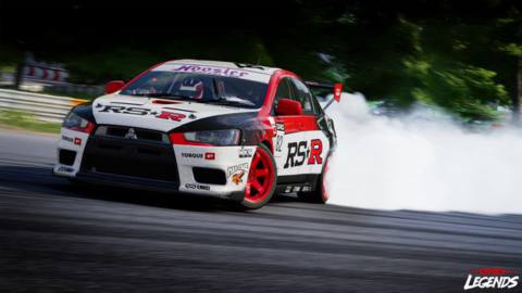 a drift car countersteers into a corner, leaving a plume of smoke from its rear tires