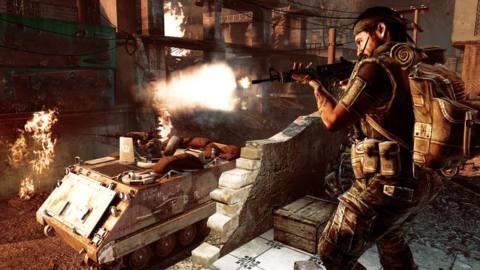Call of Duty: Black Ops - soldier firing as tank gunner fires in the background