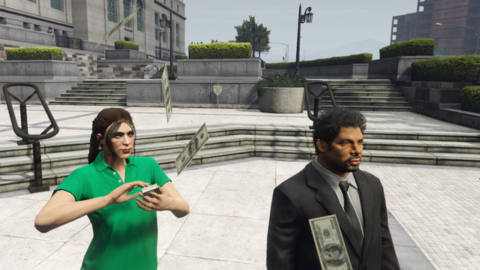 GTA Online - a woman “makes it rain” while standing next to a bemused NPC