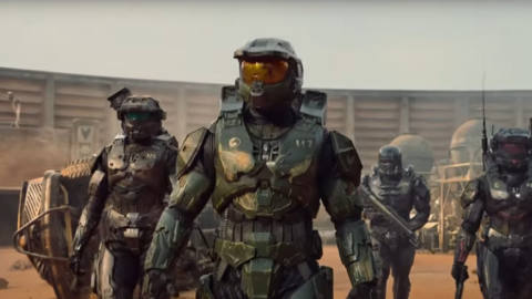 Master Chief and several Spartans walk through sand in the Halo TV show