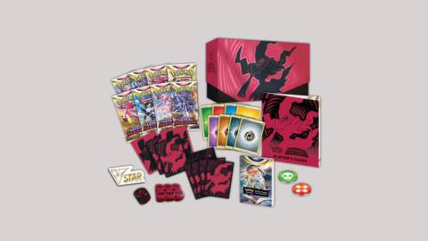an image of a card packs laid out. there are coins and a binder with pokemon art on it. 