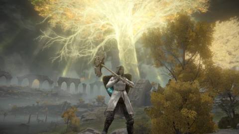 A Tarnished wields a giant ax two-handed in a screenshot from Elden Ring