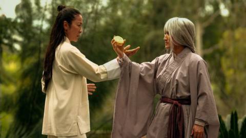 Evelyn (Michelle Yeoh) and her sensei train in the arts of kung fu in Everything Everywhere All At Once