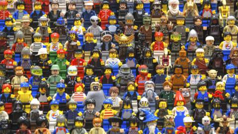 Lego figures are displayed on the opening day of BRICK 2014