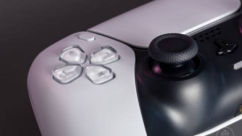 a close-up of the D-pad and left analog stick of the PS5’s DualSense controller