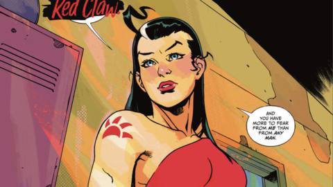 Red Claw, a muscular woman with long dark hair streaked with white, wears a boldly colored off-the shoulder bodysuit with a bear paw tattoo on her shoulder and carries a pistol. “I am Red Claw,” she says in Catwoman #43 (2022), “And you have more to fear from me than from any man.”