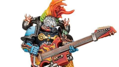 A Noise Marine rocking out. Yes, that’s a thing. He’s covered in freehand designs, including leopard print and zebra stripes.