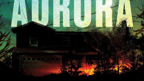 Cover of David Koepp’s Aurora, showing a house in darkness against a vivid starry sky, with a blaze of orange firelight in front of it
