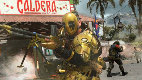 a masked fighter in gold-colored body armor raises a machine gun and fires