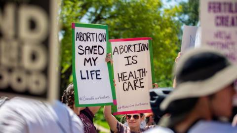 National Rallies For Abortion Rights Held Across The U.S. include this one in Austen, Texas. Signs read “Abortion saved my life” and “Abortion is healthcare.”