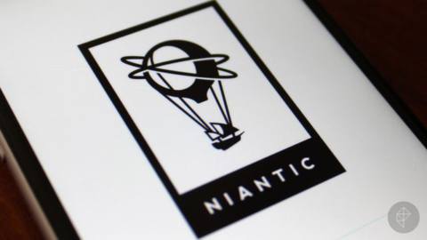 A photo of a phone displaying the Niantic logo