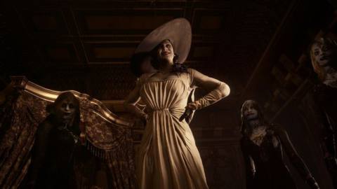 Lady Dimitrescu and her “daughters” look down upon protagonist Ethan Winters in a screenshot from Resident Evil Village