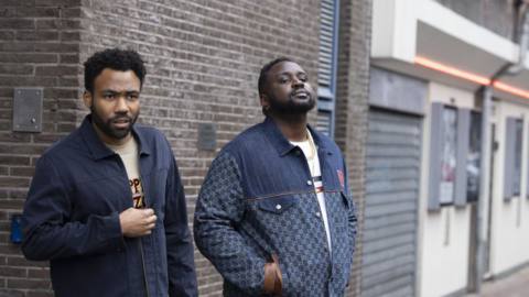 Earn Marks and his rapper cousin Paper Boi in the streets of Amsterdam in season 3 of FX’s Atlanta.