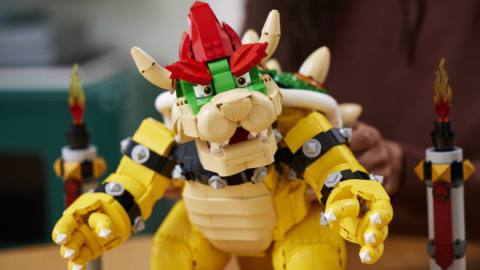 The Mighty Bowser Lego set sits on a table, looking menacing