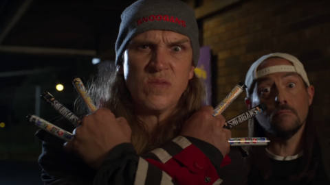 Jay poses with candy in his hands next to Silent Bob from Clerks 3 
