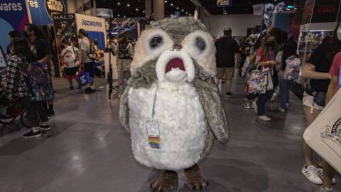 Star Wars cosplayer Andrea Seale as a Porg walks the convention floor at 2022 Comic-Con International Day 3 at San Diego Convention Center on July 23, 2022 in San Diego, California