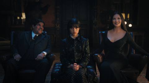 Luis Guzmán as Gomez Addams, Jenna Ortega as Wednesday Addams, and Catherine Zeta-Jones as Morticia Adams in Netflix’s Wednesday