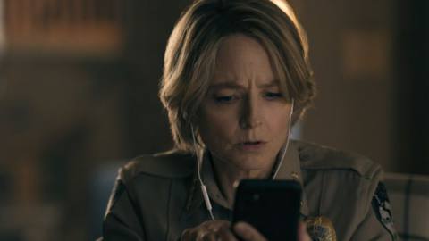 Jodie Foster as Chief Liz Danvers looking at a phone in True Detective: Night Country.