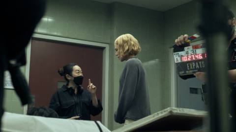 Lulu Wang talking to Nicole Kidman behind the scenes on the set of Expats