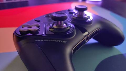 Thrustmaster X 2 Pro controller on a desk.