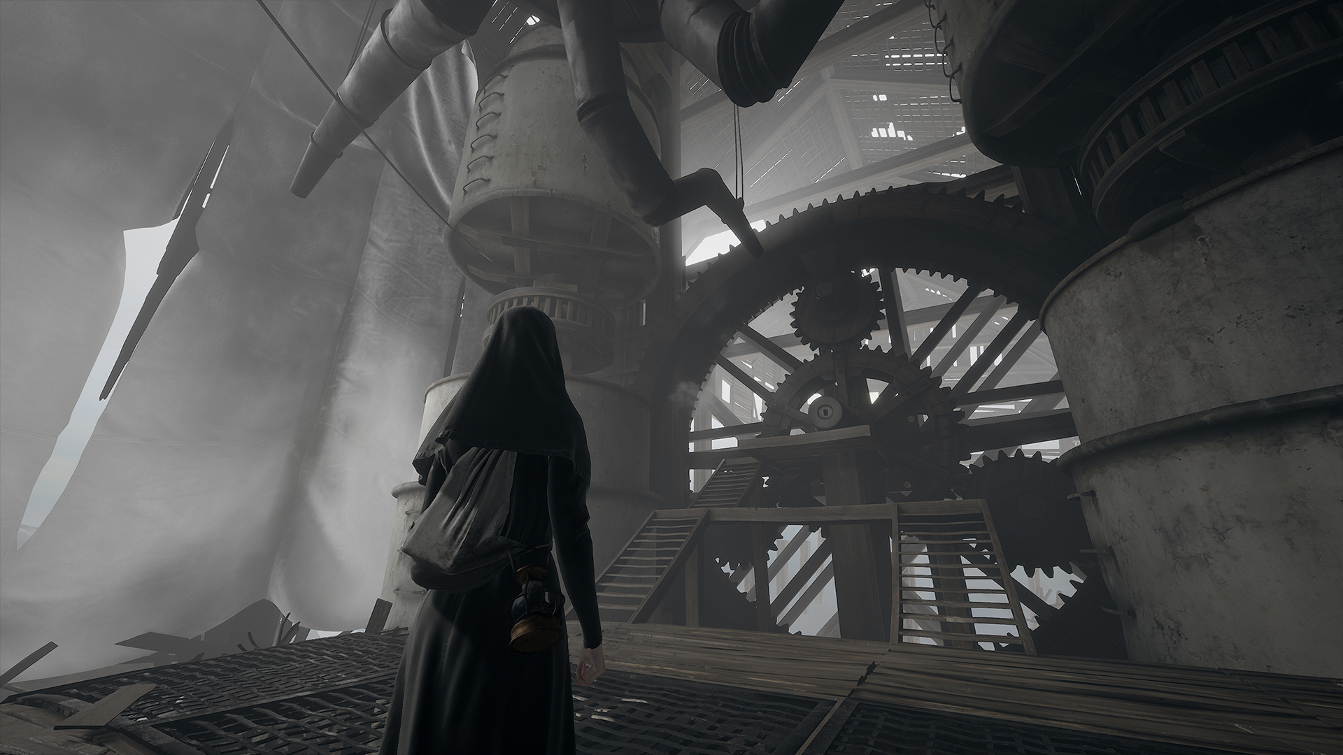 Indika looks upwards at a towering factory interior.