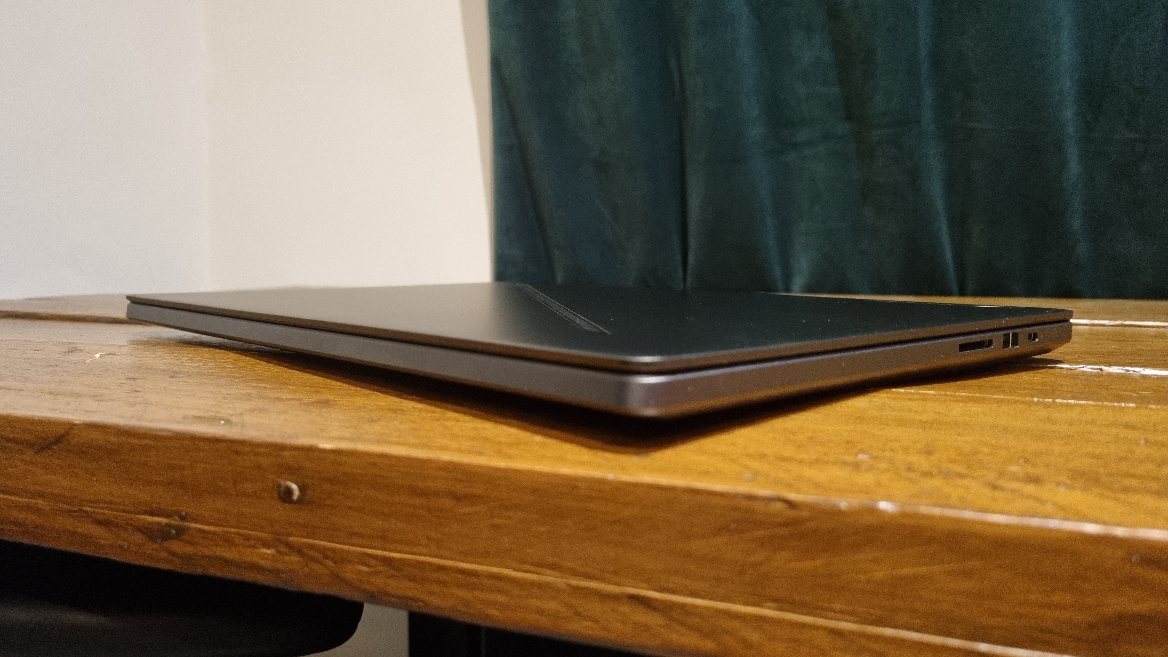 The Asus ROG Zephyrus G16 closed on a desk