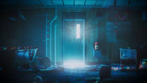 A glowing blue light shines from behind a shut door