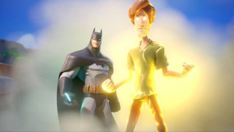 Batman and Shaggy standing side by side in front of glowing fog from the cinematic trailer for MultiVersus. Shaggy is powered up.