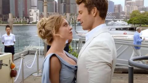 Bea, a pretty blond woman, stands chest-to-chest with Ben, a smirking blond man