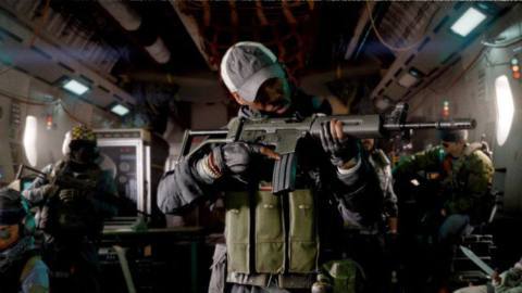 Three different combatants from Call of Duty: Black Ops Cold War are decked out in full body armor, carrying guns; the center figure is aiming an assault rifle somewhere off-screen