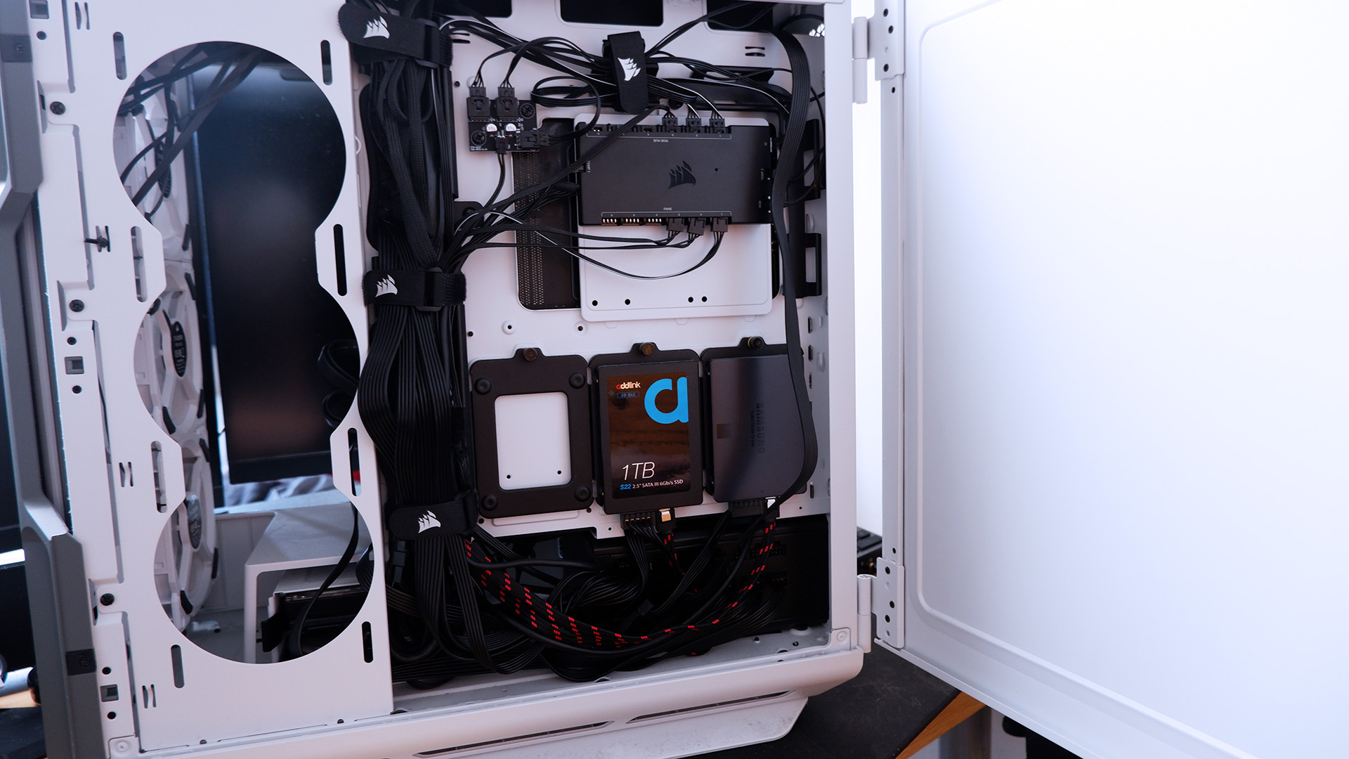 Corsair RMx SHIFT power supply being installed in a gaming PC