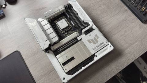 Asus TUF Gaming Z790-BTF motherboard on a grey desk