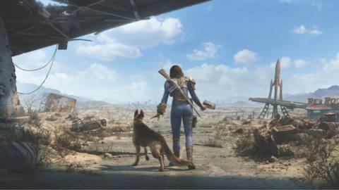 Nora, a woman in a Vault Dweller suit with a rifle slung over her back, walks through the Commonwealth wasteland with Dogmeat, a German Shepard, by her side.
