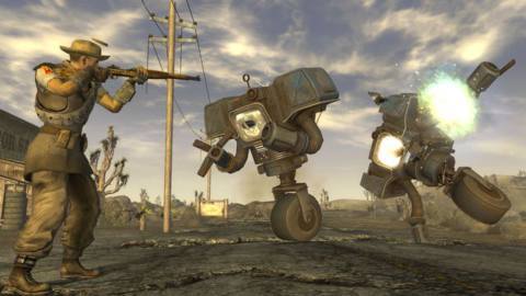 a man shoots some robots with a hunting rifle in Fallout: New Vegas