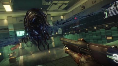 A first person view shot from Prey, which shows Morgan Wu pointing a rifle at an approaching Typhon. The Typhon is black and inky, floating menacingly with many limbs.