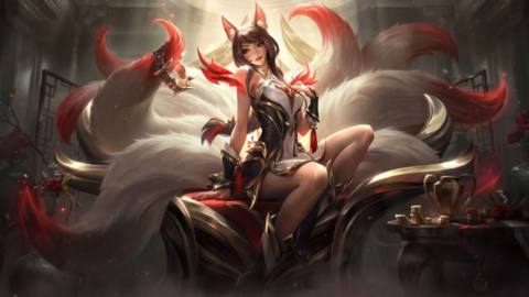 Risen Legend Ahri splash art in League of Legends, showing a nine-tailed fox woman lounging amidst tokens from fans, trophies, a crown, and other signs of wealth and success.