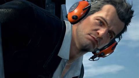 A close-up shot of Frank West’s face as he is about to jump from a helicopter in Dead Rising Deluxe Remaster