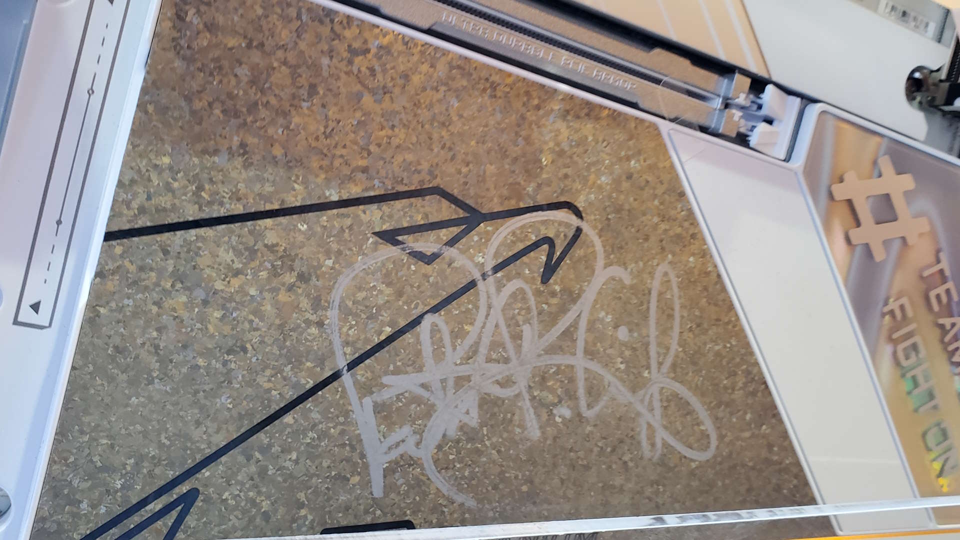 A photo of the signature of Intel's Pat Gelsinger on a Gigabyte motherboard, on display at Computex 2024