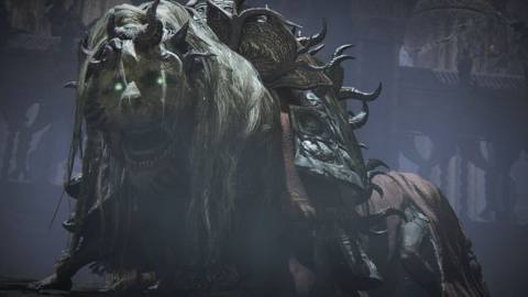 The Divine Beast Dancing Lion stands in front of a castle for an Elden Ring DLC boss fight.
