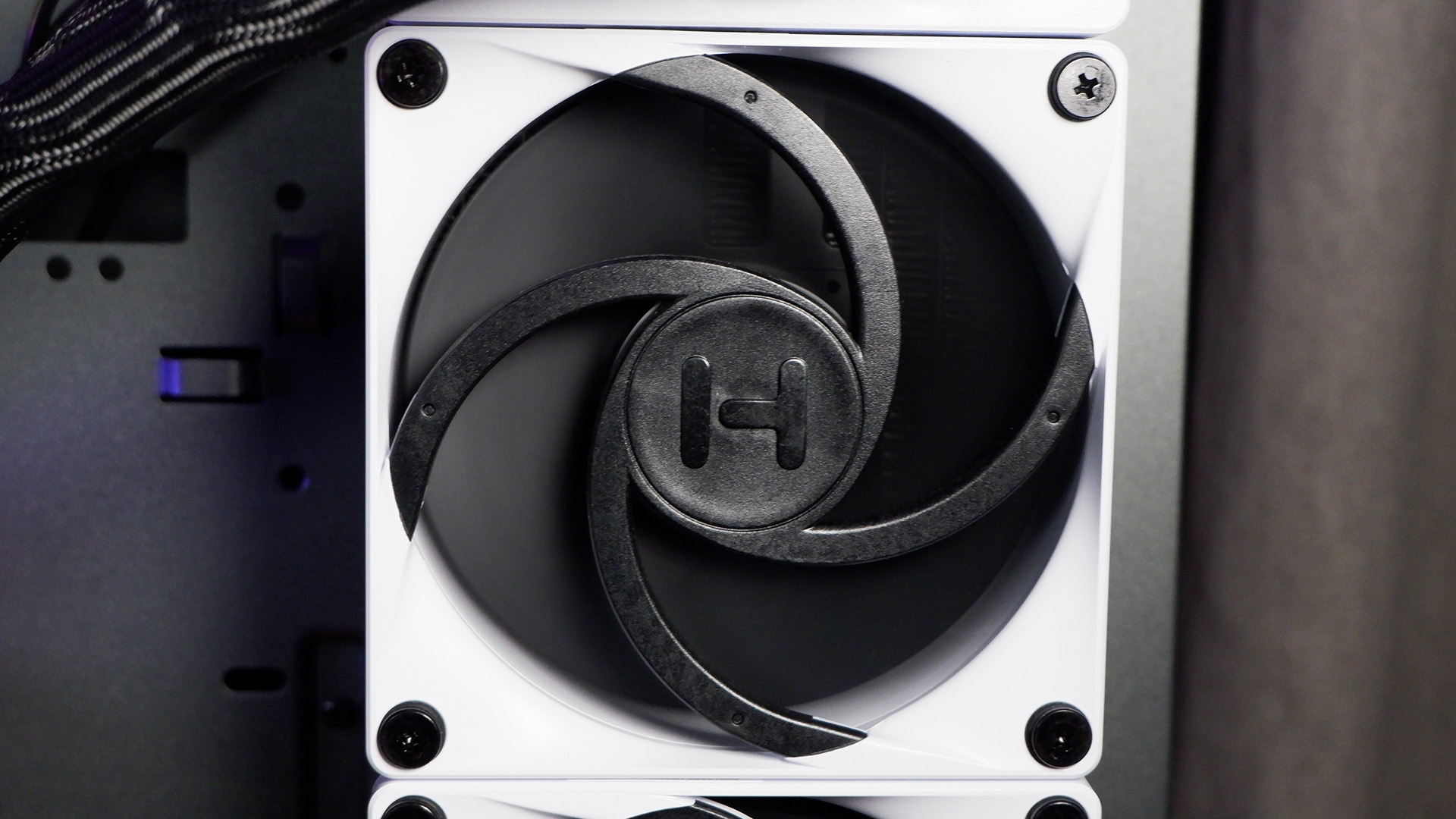 Hyte's Thicc Q60 liquid cooler with a huge 5-inch screen on the cold plate.