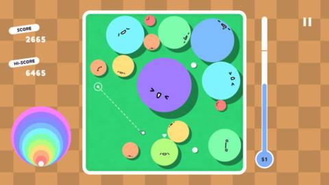 A screenshot from POOOOL, showing a whole bunch of colorful balls inside a box. They’re cute and have faces.