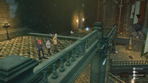 Three teenagers in colorful outfits stand on an interior stone staircase in a huge, ornate stone building in a screenshot from Metaphor: ReFantazio