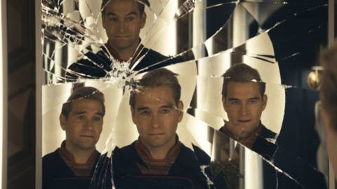 Homelander looks at multilple reflections in a shattered mirror in The Boys season 4