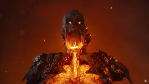 A zombie opens its maw in the State of Decay 3 trailer, glowing with some kind of orange power that looks suspiciously similar to lava. The zombie stares at the survivor in its line of sight with livid orange eyes.