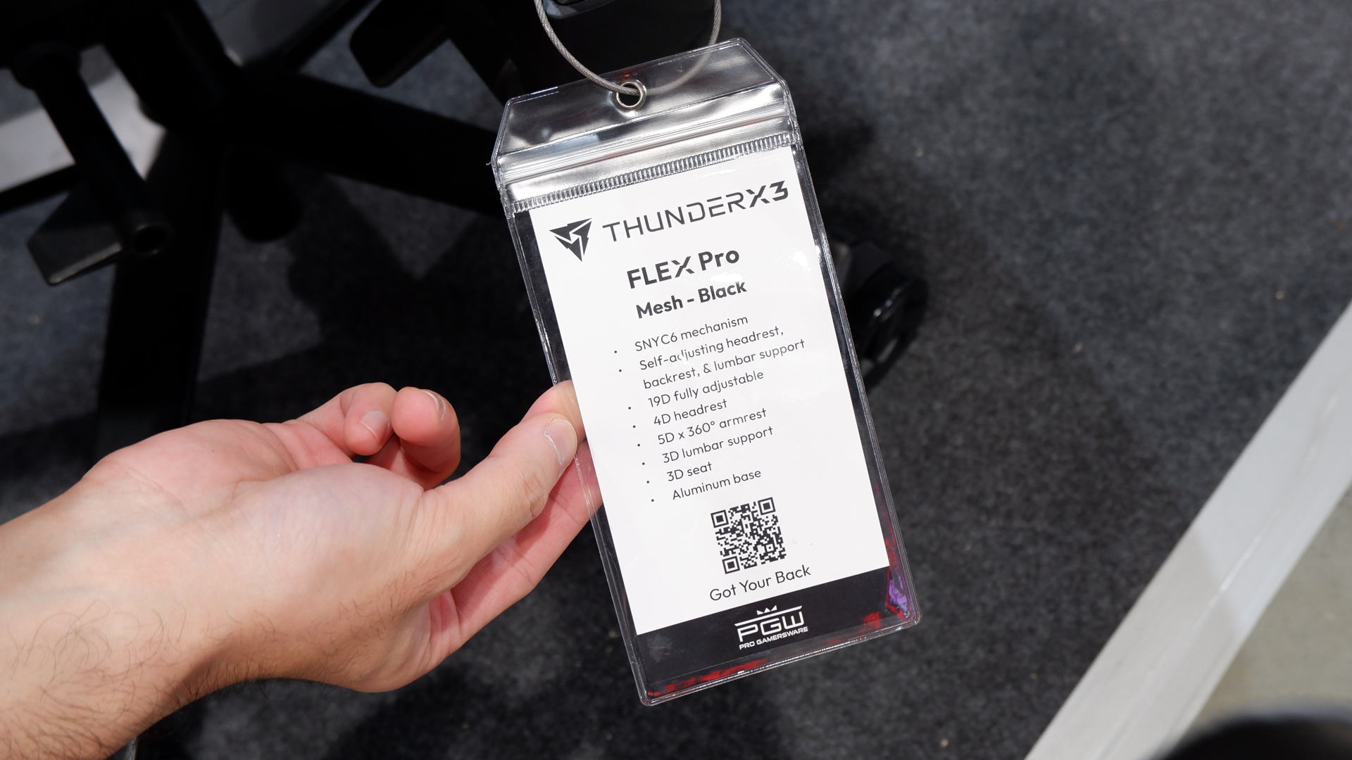 A photo of the specifications tag for the ThunderX3 Flex Pro gaming chair, on display at Computex 2024